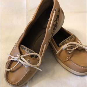 Sperry deck shoe with leopard print accent